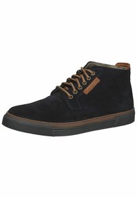 Bottes de cheville en daim bleu marine foncé avec des lacets bruns, semelle en caoutchouc et accent en cuir tan. Présente une surface texturée et des détails cousus.