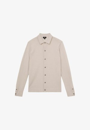 Beige long-sleeve shirt with a pointed collar, button-down front, and matching buttons; smooth texture and tailored fit.