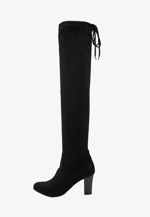 Botte noire en suède montant jusqu'au genou, avec un bout arrondi, un talon bloc et un lien à nouer à l'arrière du haut pour un ajustement réglable.