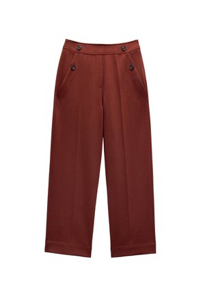Szerokie, rdzawoczerwone spodnie wykonane z gładkiego materiału. Posiadają dwie przednie kieszenie i dekoracyjne guziki w pasie. Czyste wykończenia.