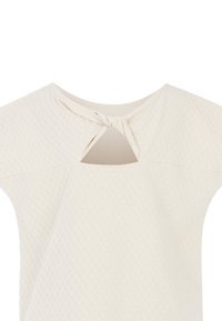 Krátký rukáv top v off-white texturované látce s otvorem ve tvaru klíče na zádech, s uvázaným detailem na výstřihu.