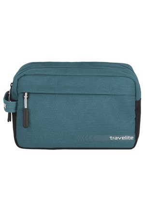 Borsa da viaggio teal per articoli da toeletta con superficie texturizzata, dettagli neri, scomparti con doppia cerniera e manico laterale per un facile trasporto.
