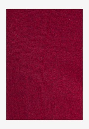 Tejido de punto de color rojo intenso con una textura suave, que presenta un sutil patrón jaspeado y detalles de costura visibles.