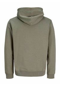 Huppari hillityssä oliivinvihreässä. Pehmeää kangasta, resorireunukset helmassa ja hihansuissa, saumattomat olkapäät ja minimalistinen muotoilu. Edessä ei näy yksityiskohtia.