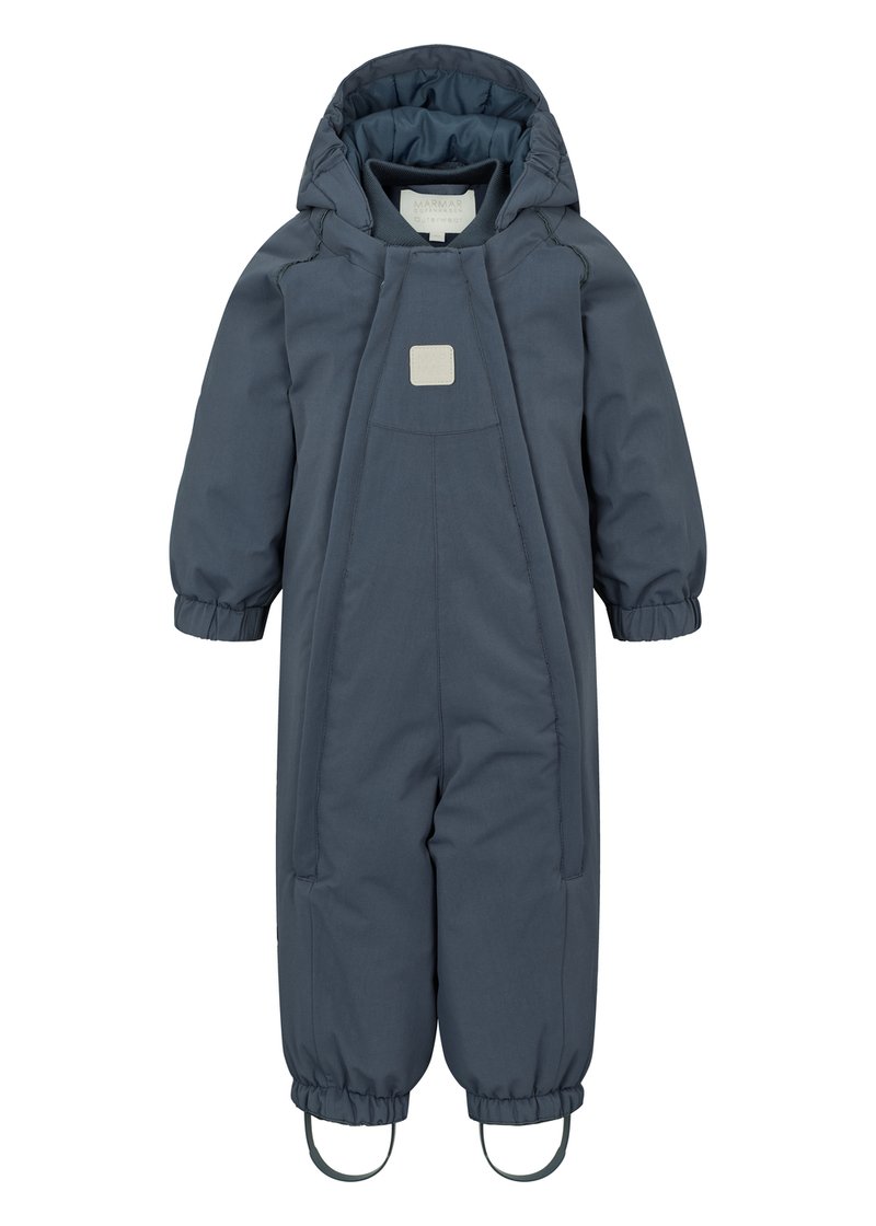 Tykk marineblå snowsuit med hette, elastiske mansjetter og fotstropper. Har en glatt tekstur og lomme i midten med en firkantet detalj.