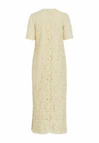 Robe midi en dentelle crème avec manches courtes, motif floral et fente dans le dos.