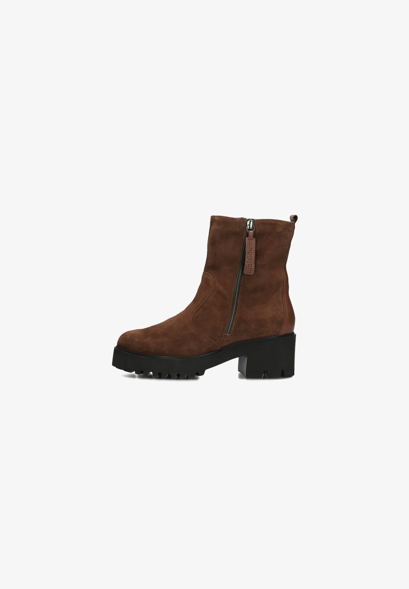 Brown suede ankle boot with a side zipper, chunky black platform sole, and a textured finish. Features a small pull tab at the back.