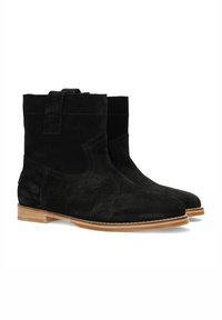 Black suede ankle boots with a low stacked heel, featuring a pull tab, subtle stitching, and a smooth tan leather sole.