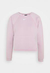 Sweatshirt Nike rose clair avec col rond, texture côtelée sur les manches et logo blanc sur la poitrine. Coupe courte avec poignets ajustés.
