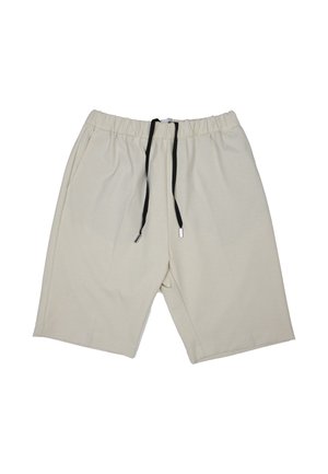 Beige shorts made of soft fabric. Features an elastic waistband with a black drawstring. Loose fit with knee-length legs and no visible patterns.