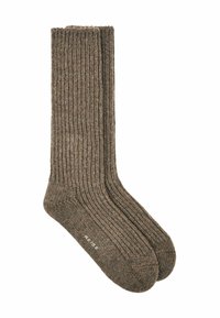 Braune, gerippte Socken aus strukturiertem Material mit runder Zehenform und umgeschlagenem Saum. Markenlogo ist an der Unterseite sichtbar.