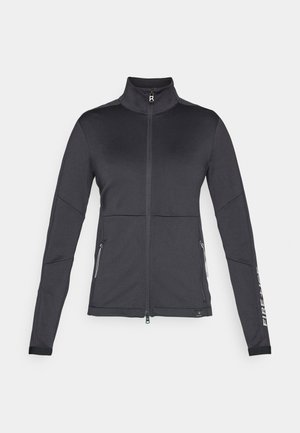 Black full-zip jacket with high collar, long sleeves, zippered side pockets, and "FIRE + ICE" text on left sleeve.