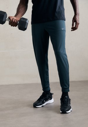 TOTALITY PANT - Verryttelyhousut - seaweed/black