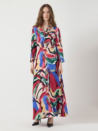 Long, multicolored dress featuring abstract shapes in red, blue, green, and yellow. Made of lightweight fabric with a button-down front.