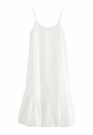 Robe blanche sans manches avec une coupe ample, présentant un ourlet évasé et une texture froncée en bas. Fabriquée en tissu léger.