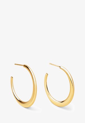 Złote kolczyki w kształcie obręczy o gładkim, błyszczącym wykończeniu. Posiadają zakrzywioną formę z otwartymi końcówkami oraz smukły słupek do mocowania.