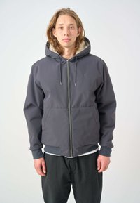Grau kapuzenjacke mit durchgehendem Reißverschluss, weicher Innenausstattung, elastischen Bündchen und zwei vorderen Taschen. Lässiges Design mit strukturiertem Finish.
