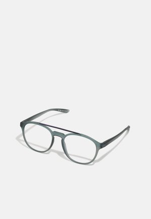 Lunettes teintées de vert avec une monture ronde, fabriquées en matériau léger. Présentent une finition mate et des branches légèrement courbées pour le confort.