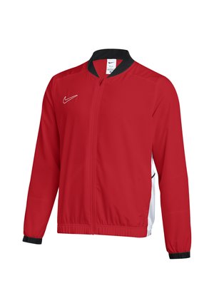 Rote Nike-Sportjacke mit durchgehendem Reißverschluss, schwarzem Kragen und Bündchen, weißen Seitenpaneelen und weißem Nike-Logo auf der Brust.