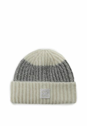 Knit beanie featuring a light gray and cream color scheme, ribbed texture, and a folded cuff with a small logo patch.
