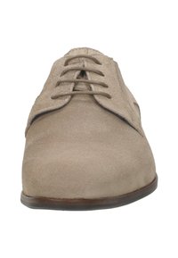 Tan leren dress shoes met een ronde neus, vetersluiting en een glad, gestructureerd oppervlak. Inclusief een subtiele afwerking aan de rand.
