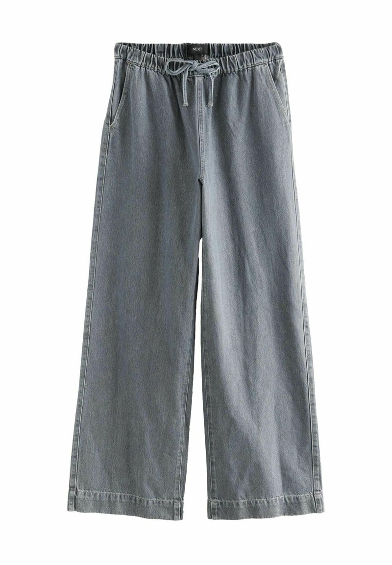 Bredde ben, elastisk talje pants i lys grå denim. Der er snor, sidelommer og enkel syning. Blød tekstur og afslappet design.