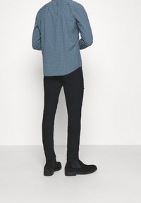 Jack & Jones Vaqueros pitillo - black denim