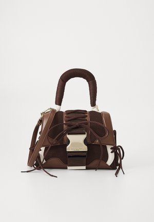 Brown handbag with a textured mesh design, featuring a structured shape, tied laces, silver hardware, and a contrasting white base.