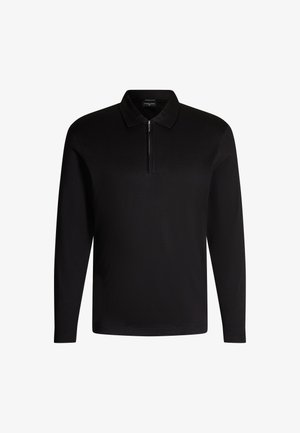 Czarna polo z długim rękawem i zamkiem błyskawicznym przy szyi. Wykonana z miękkiego materiału, charakteryzująca się usztywnionym kołnierzykiem i swobodnym krojem. Bez widocznych wzorów.