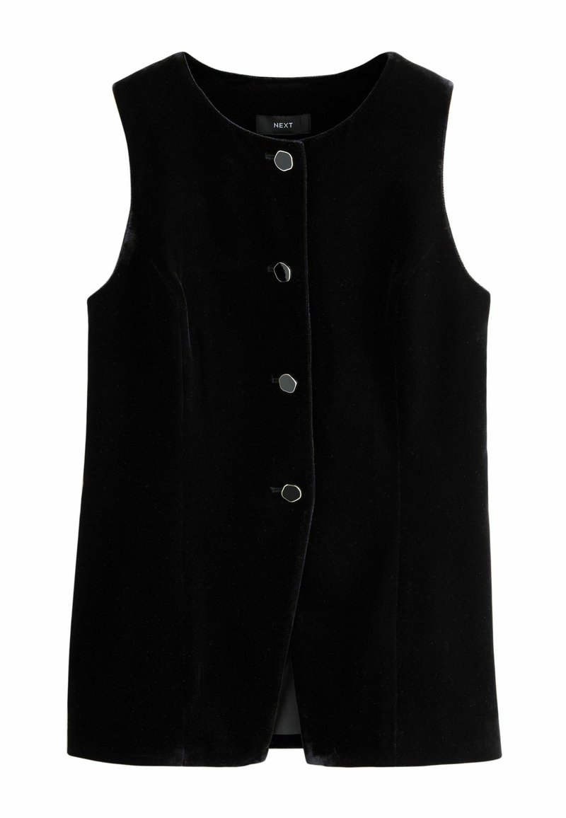 Chaleco negro sin mangas, hecho de terciopelo. Cuenta con un cuello redondo y cinco botones hexagonales en la parte delantera. Textura suave.
