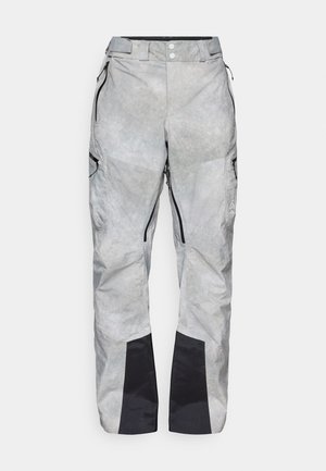 Calças de neve cinzentas com um acabamento texturizado, bolsos com fecho de correr e detalhes em preto nas bainhas. Apresenta uma cintura com botão e tecido durável.