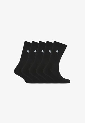 Schwarze Baumwollsocken im Crew-Stil, im Fünferpack, mit geripptem Design und einem kleinen weißen Logo auf jeder Socke, glatte Textur und Standardlänge.