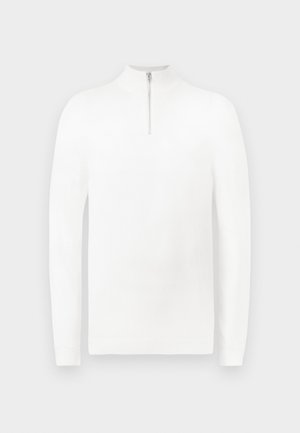 Pulover alb cu guler tip fermoar, cu mâneci lungi, fabricat dintr-un material neted. Prezintă un design minimalist și manșete și tiv cu dungi.