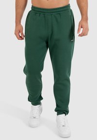 Smilodox CASUAL SPORT FIERO - Trainingsbroek - grün