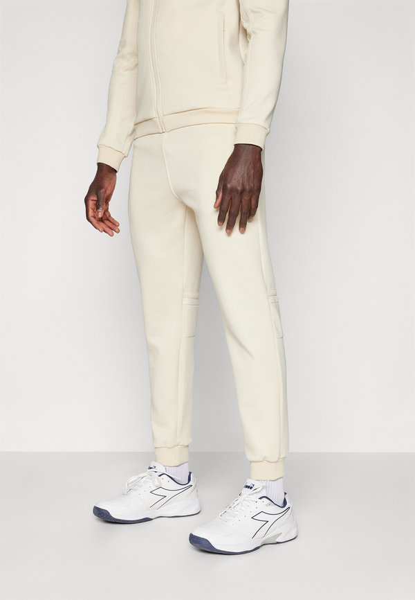 DOMINO PANTS - Jogginghose - wood ash