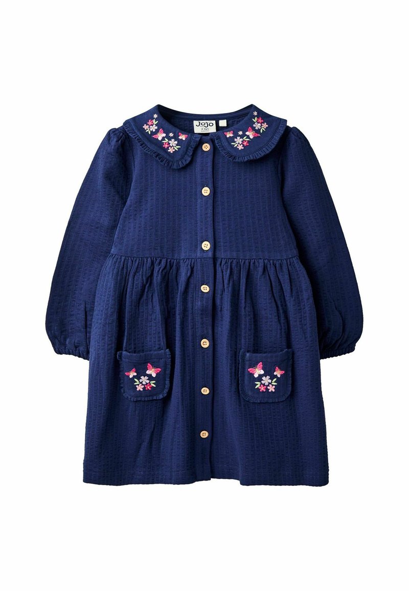 Marineblaues Baumwollkleid mit Knöpfen, einem Rüschensaumkragen und bestickten floralen Akzenten auf den Brusttaschen. Lange Ärmel mit elastischen Bündchen.