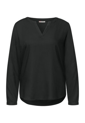 Haut noir à manches longues avec un col en V, fabriqué en tissu lisse. Présente un ourlet légèrement arrondi et des poignets boutonnés sur les manches.