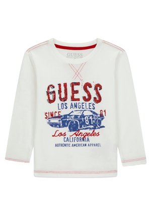 Hvid langærmet skjorte med rød syning og grafik af en blå vintagebil samt teksten "GUESS Los Angeles California" foran.