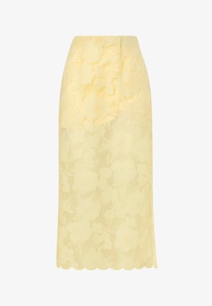 Jupe midi jaune avec un voile floral transparent et un ourlet festonné, présentant des motifs floraux texturés en couches sur toute la surface.