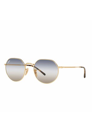 Occhiali da sole ottagonali dorati con lenti grigie sfumate. Montatura in metallo sottile e punte dei templi con motivo tartarugato. Logo Ray-Ban sulla lente.