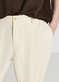 Calliope TINTA UNITA - Pantaloni - sabbia