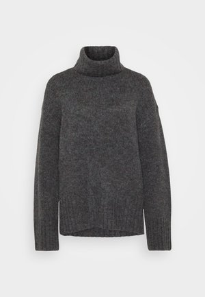 Suéter de punto gris con cuello alto y textura acanalada, de mangas largas y un corte relajado. El material parece suave y grueso. El dobladillo inferior es recto.