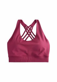 Top sportivo in mauve con una texture liscia, caratterizzato da un design incrociato sul retro e spalline larghe. La banda inferiore è elastica per offrire supporto.