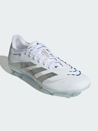 White soccer cleat with blue accents, textured synthetic upper, and three grey stripes. Features a low profile and transparent outsole.