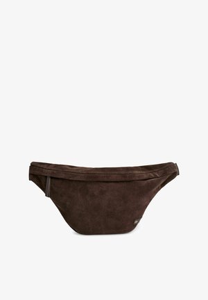 Brown suede fanny pack with a smooth texture, curved shape, top zipper closure, and a small logo accent on the front.