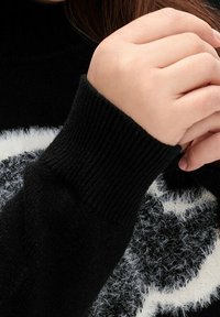 Sheego Strickpullover - black
