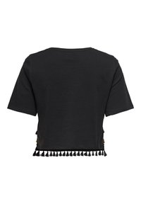 Camiseta corta negra con mangas cortas y un dobladillo texturizado acentuado por borlas. Fabricada en suave algodón.