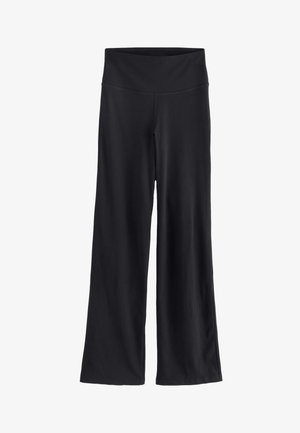 Zwarte wijde broek met een hoge elastische tailleband, gemaakt van geribd stof, plat weergegeven op een witte achtergrond.