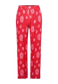 Pantalons rouges à texture côtelée, avec un motif aquatique rose comprenant des coquillages et des designs de corail. Taille élastique. Coupe droite.