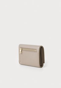 Folded wallet made of light beige textured leather, featuring a gold zipper accent and a compact rectangular shape.